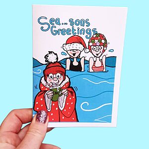 cartoon of 3 ladies swimming in christmas hats